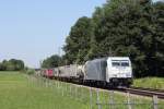 185 662-4 (Lokomotion) fhrt am 27. Juli 2012 um 14:21 Uhr mit einem Gterzug durch Grokarolinenfeld