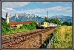 ES64U2-033 bringt einen Kombizug vom Grenzbahnhof Brenner/Brennero nach Mnchen. Aufgenommen im Sommer 2005 beim Kloster Raisach.