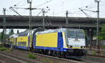 metronom Eisenbahngesellschaft mbH, Uelzen [D] mit der neu gestalteten  146-03  [NVR-Nummer: 91 80 6146 503-8 D-BTH] und einem Regionalzug am 07.06.21 Ausfahrt Bf.