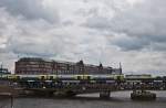 MEr81916 (Hamburg Hbf - Bremen Hbf) am 28. August 2011 mit einer unbekannt gebliebenem Zuglok (146 ***) auf der Hamburger Oberhafenbrcke.