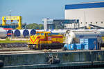 Lok 77 (BR 345) der MEG mit Kesselwagen im Rostock Port.