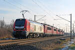 159 226 der MEG schleppte am 07.12.21 einen Schrottlok-Zug von Engelsdorf nach Opladen, hier passiert der Zug Greppin Richtung Dessau.
