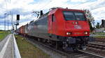 MEG - Mitteldeutsche Eisenbahn GmbH, Schkopau [D] mit der  145 022-0   [NVR-Nummer: 91 80 6145 022-0 D-DB] und einem Containerzug am 18.04.24 Höhe Bahnhof Rodleben.