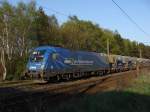 1116 912-5 der MWB mit einem Ganzzug railpro Schotterwagen auf der Fahrt in Richtung Braunschweig. Fotografiert am 13.04.2009 unter der Straenbrcke Diesdorfer Graseweg in Magdeburg.