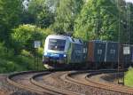 182 911-8 / 1116 911-7 mit Containerzug in Fahrtrichtung Norden. Aufgenommen am 22.06.2010 kurz hinter Eschwege West.