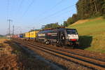 MRCE 189 108  Alpäzähmer  unterwegs im Morgengrauen mit einem UKV-Zug zwischen Eglisau und Glattfelden, kurz vor dem Bahnhof Eglisau.