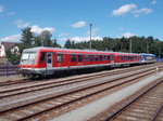 628 553 und der NEB VT 014,am 19.August 2016,neben der Einsatzstelle Basdorf.