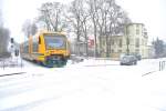 ODEG VT 650 bei Schneefall. Innerhalb 5 stunden ist am 27.01.2014 ca. 1.5 cm Schnee gefallen. Die ODEG vor dem BÜ in Niederlehme
