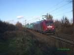 185 534 am 1.12.2007 mit einem Containerzug durch LImmer. (Bearbeitet)