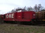 OHE 120068 wartet vor einem Holzzug in Arnsberg. (01.04.08)