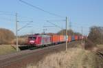 Am 19.03.2011 fuhr 185 534-5 der OHE mit einem Containerzug auf der KBS 310 in Richtung Braunschweig. Fotografiert in Magdeburg Diesdof. 