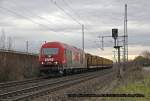 OHE 270080 mit einem Holzzug am 21.12.2013 in Köln Porz Wahn.