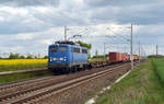 140 047 der Press schleppte am 25.04.20 einen Containerzug für Metrans aus dem Terminal Leipzig-Wahren kommend durch Rodleben Richtung Magdeburg.