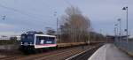 Am 07.02.14 zog die 110 511 (043) der Pressnitztalbahn einen leeren Schwellenzug von Zossen nach Kargow in Mecklenburg.