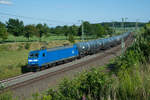 145 030-7 mit einem Kesselwagenzug bei Reuth (i.