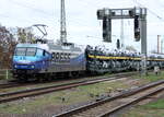 PRESS 145 030-7 (91 80 6145 085-7 D-PRESS) mit einem Autotransportzug Richtung Hauptbahnhof, am 05.04.2024 in Magdeburg-Neustadt.