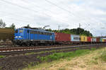 PRESS mit der 140 038-0 unterwegs mit einem Containerzug in Richtung Lüneburg.