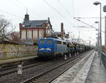 PRESS 140 017-5 (91 80 6140 806-1 D-PRESS) mit einem Autotransportzug Richtung Leipzig-Wahren, am 18.02.2022 in Leipzig-Plagwitz.