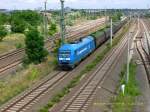 253 014 der PRESS zieht am 05.07.08 einen leeren Holzhackschnitzelzug durch Bitterfeld Richtung Leipzig/Halle. Zum Zeitpunkt der Aufnahme fuhr sie fr Regental Cargo.