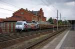 145 023-6 PRESS  125 Jahre Fleischmann  (145 083-2) mit einem Holzzug in Rathenow und fuhr in Richtung Stendal weiter. 17.07.2012