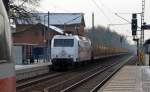 145 023 befrderte am 20.01.13 leere Holztransportwagen von Reichenbach(Vogtl.) nach Frankfurt(O). Hier durchfhrt sie Burgkemnitz Richtung Wittenberg und trifft begegnet dabei einem ICE-T der BR 411.