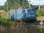 PRESS 140 038 stand mit einem Holzzug zur Abfahrt,am 02.August 2013,in Bergen/Rgen.