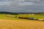 187 310 Railpool mit einer Schienenschleifmaschine bei Oberdachstetten Richtung Würzburg, 17.07.2020