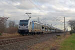 187 307 der Railpool führte für die HSL am 05.12.21 einen BLG-Autozug durch Greppin Richtung Dessau.