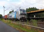 193 806-7 mit DVA Werbung zieht am 30.07.2013 einen Containerzug in Richtung Norden. Aufgenommen in Wehretal-Reichensachsen.