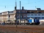  Sally  von der Rurtalbahn, eine MaK DH 1004, am 03.03.2010 mit einem leeren Autozug bei Aachen Rothe Erde unterwegs in Richtung Kln.