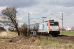 E 186 182-2 (Railpool / SBB Cargo) fhrt am 27. Mrz 2010 um 15:09 Uhr mit einem Gterzug durch Neuss Allerheiligen