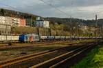 248 028 Spitzke Dual Vectron mit Schotterzug in Wuppertal Steinbeck, am 26.03.2024.