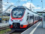ET 6442 920 der SWEG (ex ÖBB) mit dem RE 10b nach Mannheim Hbf steht in Heilbronn Hbf, 22.07.2023.