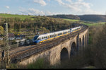 Zwei NordWestBahn Talent in Doppeltraktion überqueren am Abend des 15. April 2016 den Altenbekener Viadukt.