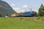 Die 192 012 von TXL mit wenigen Containern auf der Inntalstrecke bei Oberaudof in Richtung Kufstein. Aufgenommen am 26.07.21