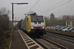 Durchfahrt von TXL ES 64 F4-096 (189-996) mit einem Containerzug am 12.12.2013 bei dichtem Nebel in Orschweier gen Offenburg.