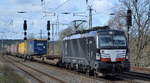 TXL - TX Logistik AG, Troisdorf [D] mit der MRCE Vectron   X4 E - 669  [NVR-Nummer: 91 80 6193 669-9 D-DISPO]und Taschenwagenzug am 11.03.20 Bf. Saarmund.