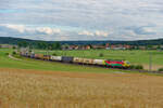 193 557 ATLU/TXL  Our Daily Heroes  mit einem KLV-Zug bei Oberdachstetten Richtung Würzburg, 17.07.2020