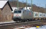 185 531-1 mit Containerzug in Fahrtrichtung Sden durch Eschwege West. Aufgenommen am 07.03.2010.