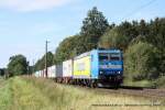 185 518-8 (TX Logistik / Transped) fhrt am 20. August 2011 um 15:30 Uhr mit einem Gterzug durch Reindorf