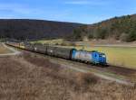 Die 185 513 mit einem Autozug am 17.03.2012 unterwegs bei Harrbach .