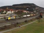 Die ES 64 F4-024 mit einem KLV-Zug am 17.03.2012 bei der Durchfahrt in Retzbach-Zellingen.