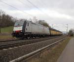 Mit ganzseitigem TXL Label rollte am 03.03.2013 die 185 407-4 mit ARS-Autotransportzug in Richtung Sden ber die KBS 613. Aufgenommen in Wehretal-Reichensachsen.