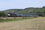 ES 64 F4 - 284 (TXLogistik) fhrt am 15. August 2013 um 11:03 Uhr mit einem Gterzug durch Himmelstadt