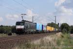 ES 64 F4 - 035 (TXLogistik) fhrt am 28. August 2013 um 16:00 Uhr mit einem Gterzug durch Reindorf