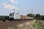 185 531-1 (TXLogistik) fhrt am 28. August 2013 um 16:56 Uhr mit einem Gterzug durch Reindorf