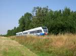 Am 21.07.2007 sind die beiden UBB-Triebwagen 646 126 und 129 unterwegs nach Stralsung, hier kurz nach dem Bahnhof Trassenheide.