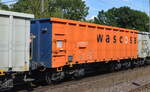 Offener Drehgestell-Güterwagen vom Einsteller WASCOSA mit der Nr. 37 TEN 80 D-WASCO 5840 573-9 Eamnos (GE) in einem Ganzzug am 31.08.22 Durchfahrt Bahnhof Niederndodeleben.