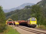 Mit Blick auf den 1738 m hohen Grnten ist am Alpsee 264 011-8 der H.F.