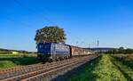 110 262 der Bayernbahn mit einem Henkelzug am 18.09.2025 bei Retzbach am Main